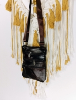 Bandolera de Piel Tarifa negra y marrón – La Gata Voladora