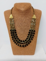 Collar Avalon de cuentas negras y doradas boho – La Gata Voladora