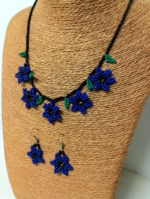 Conjunto Collar y Pendientes Flor Indigena azul artesanal colombiano La Gata Voladora Alpujarra Almeria